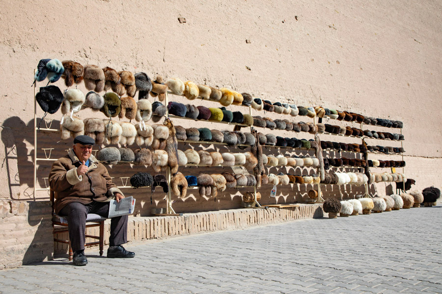 Fur Headwear Seller, Shopping in Khiva Fur Headwear Seller, Shopping in Khiva