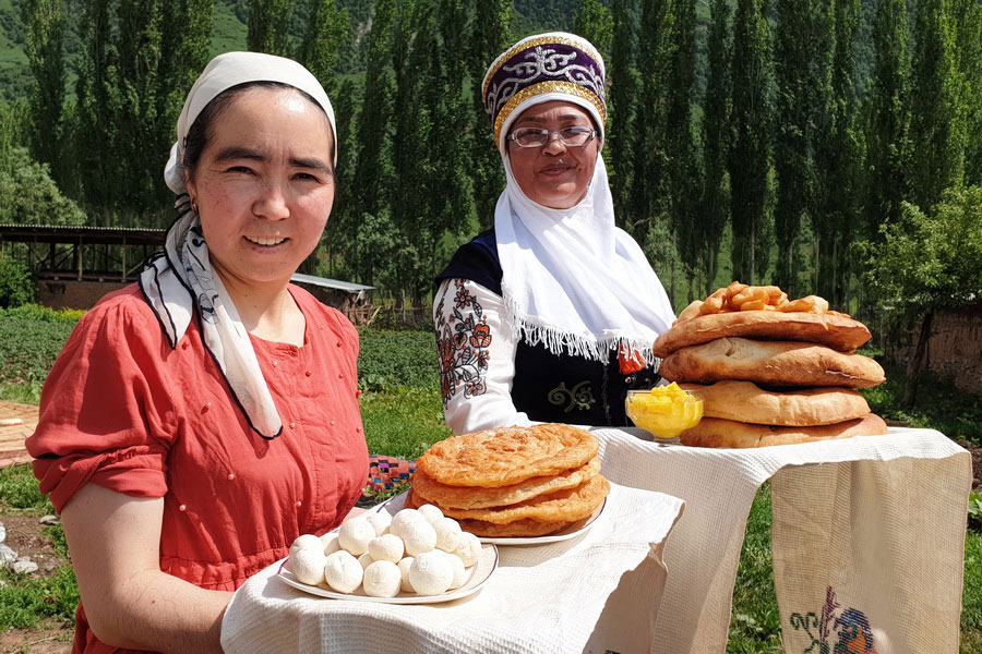 Kyrgyz women with treats, Bishkek