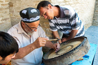 Chaser with his apprentices, Bukhara